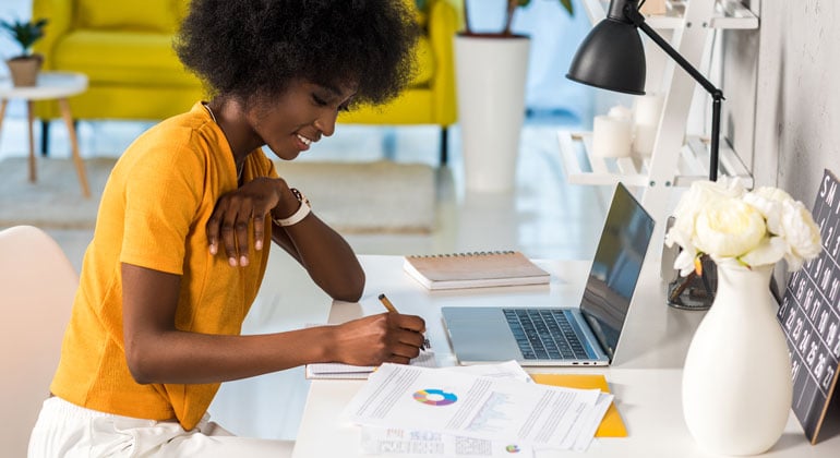 Productive woman working in home office